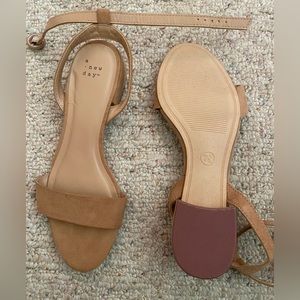 A New Day sandals in the color tan. Size 7.5